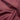 Close-up of maroon fabric with folds